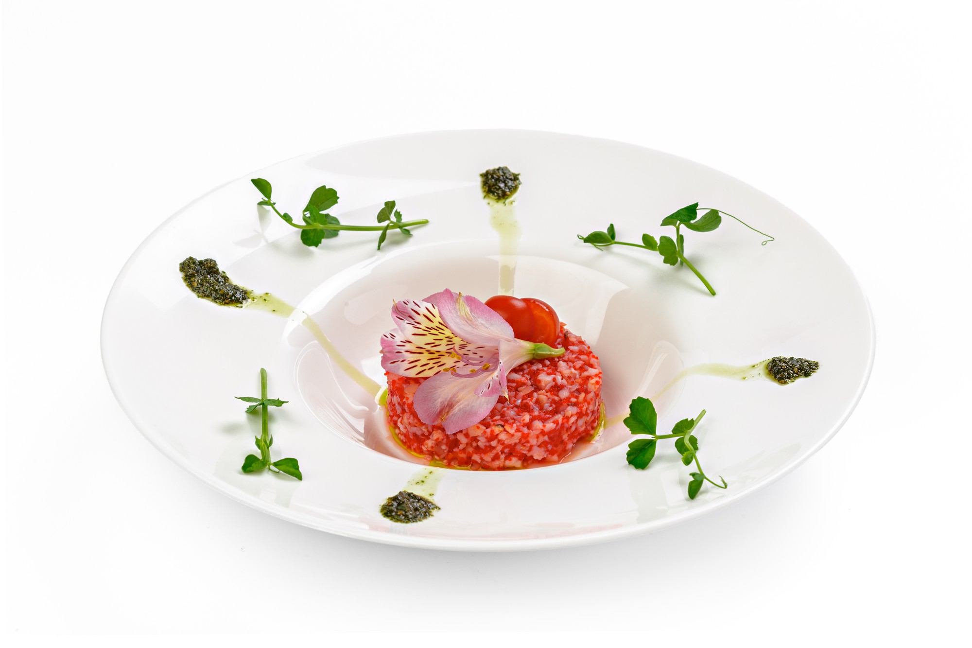 Close-up of plated modern dish during online class